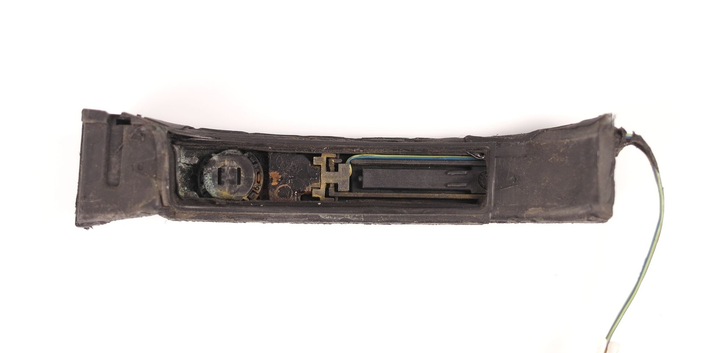 Damaged electronics in an original Keyless handle, showing corrosion