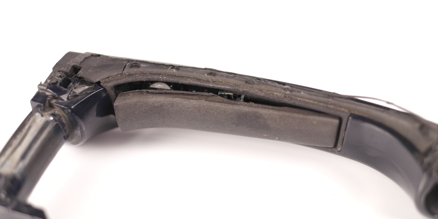 Torn rubber membrane on an original Keyless door handle